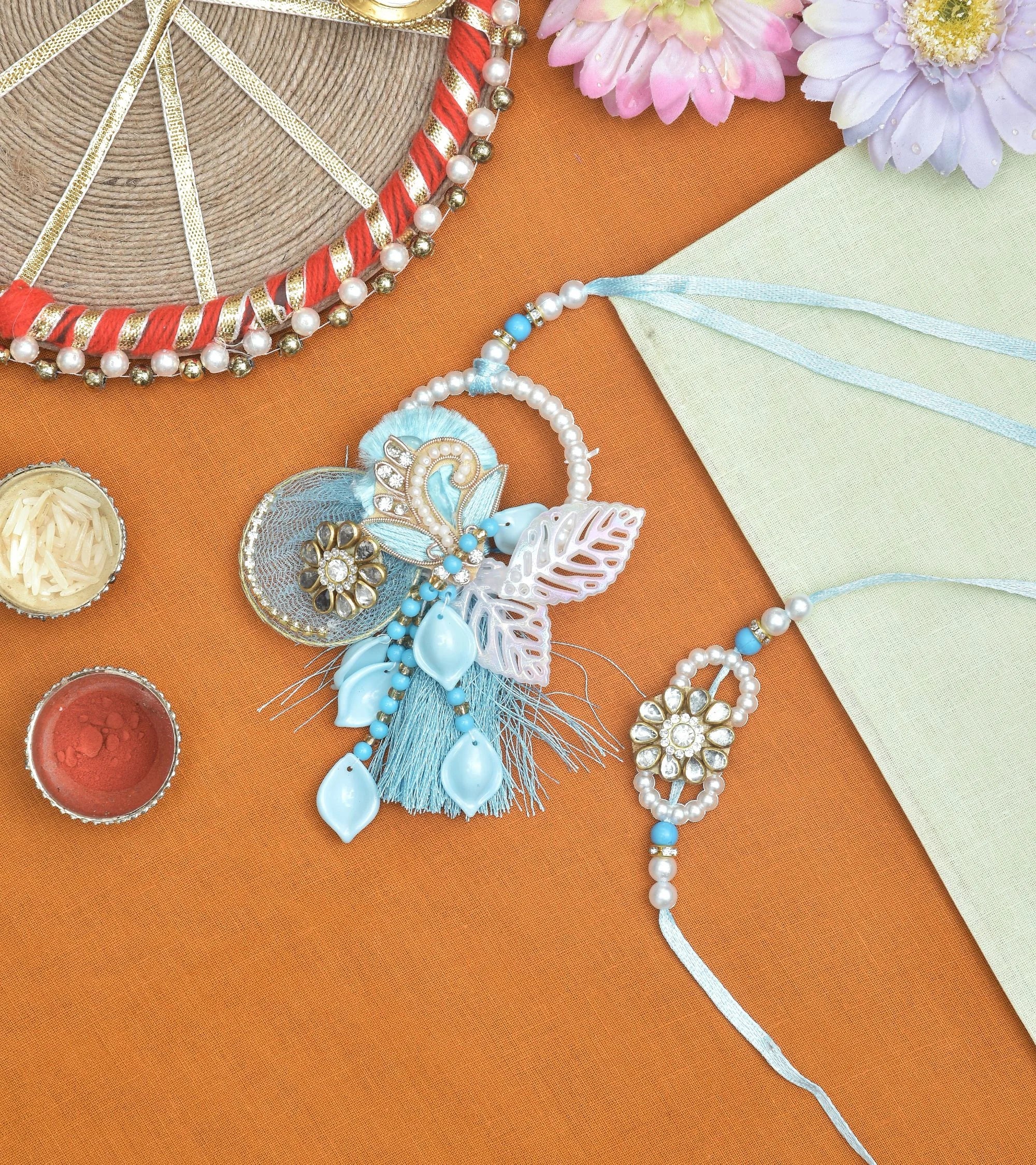 Premsons® Blue Elegant Rakhi & Lumba Pair for Brother and Sister-in-law – Ethnic Indian Rakhi Combo