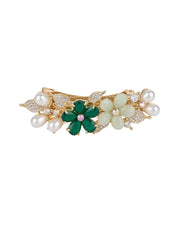 Gold-tone floral hair clip with green crystals, white stones, and pearls