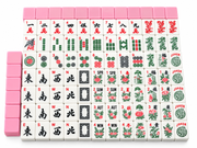 Pink-backed Mahjong tile set with Chinese character, dragon, and flower tiles; includes jokers