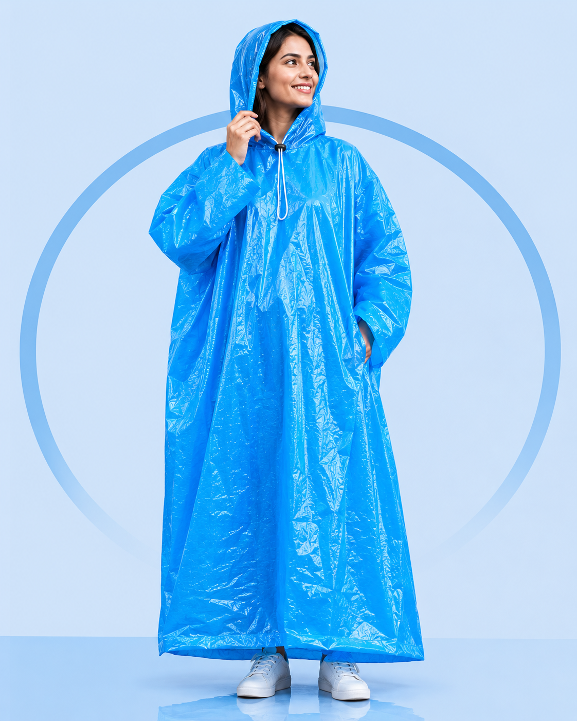 Blue hooded rain poncho with front drawstring, full-length loose sleeves