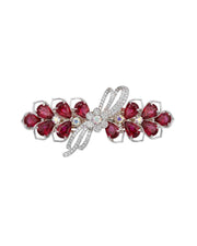 Ruby red floral crystal hair clip with silver-toned setting and faceted center