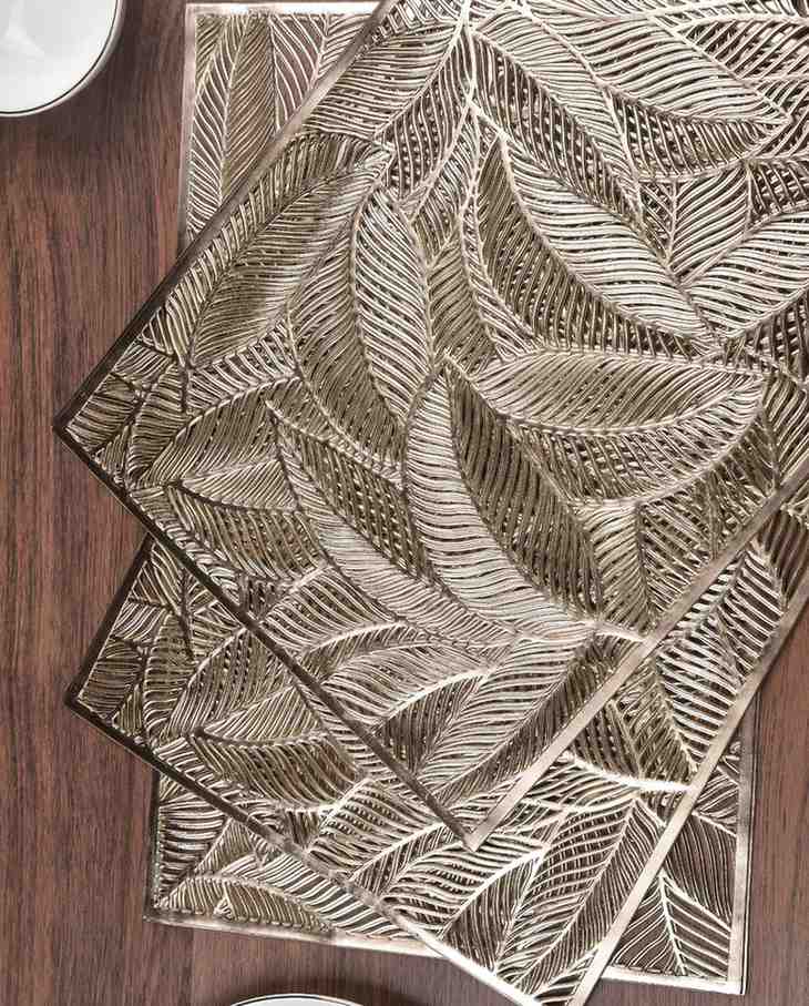 Rectangular placemat closeup with shiny metallic gold leaf texture