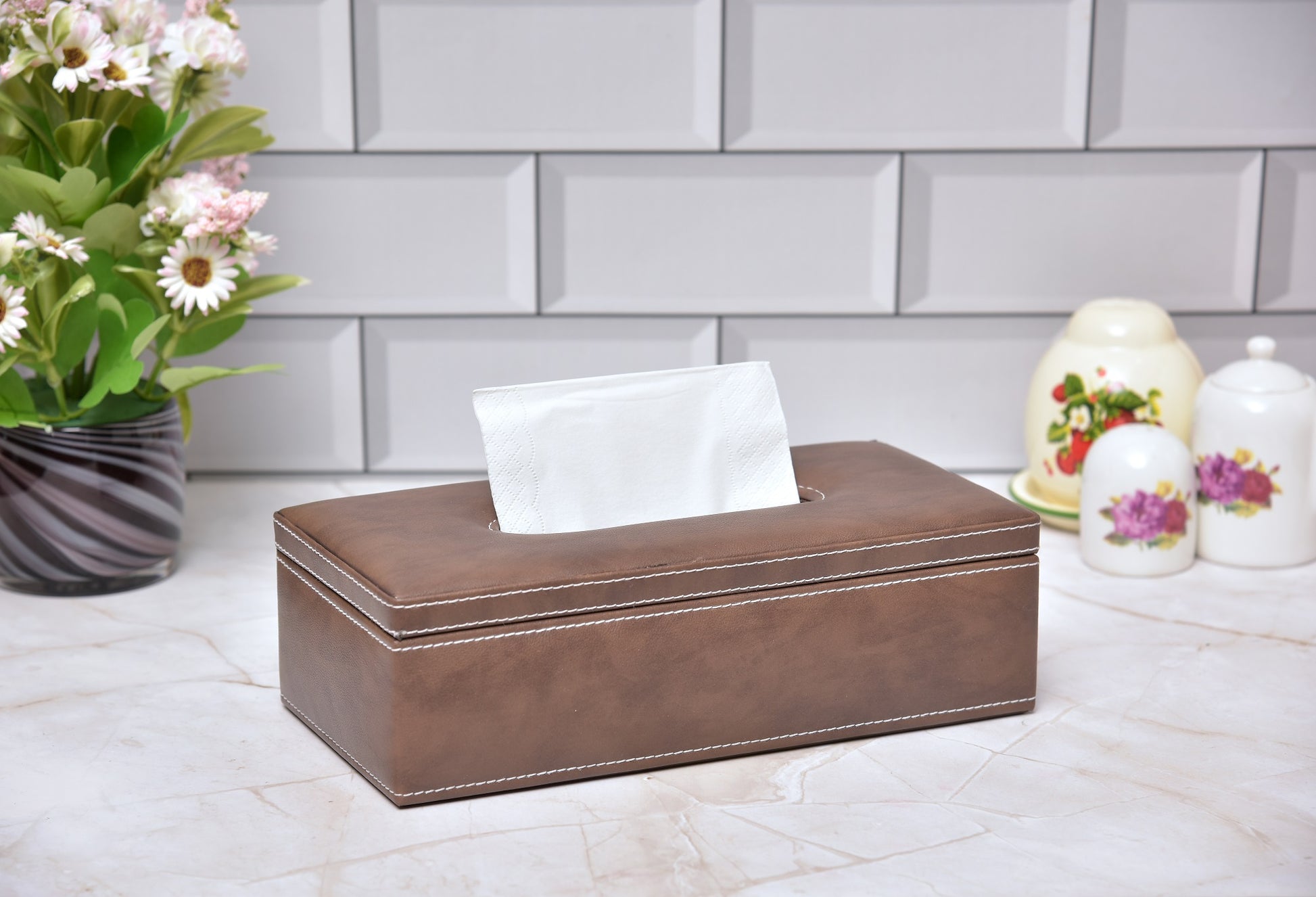 Rectangular tissue holder in dark brown leatherette with white tissues, lid-open