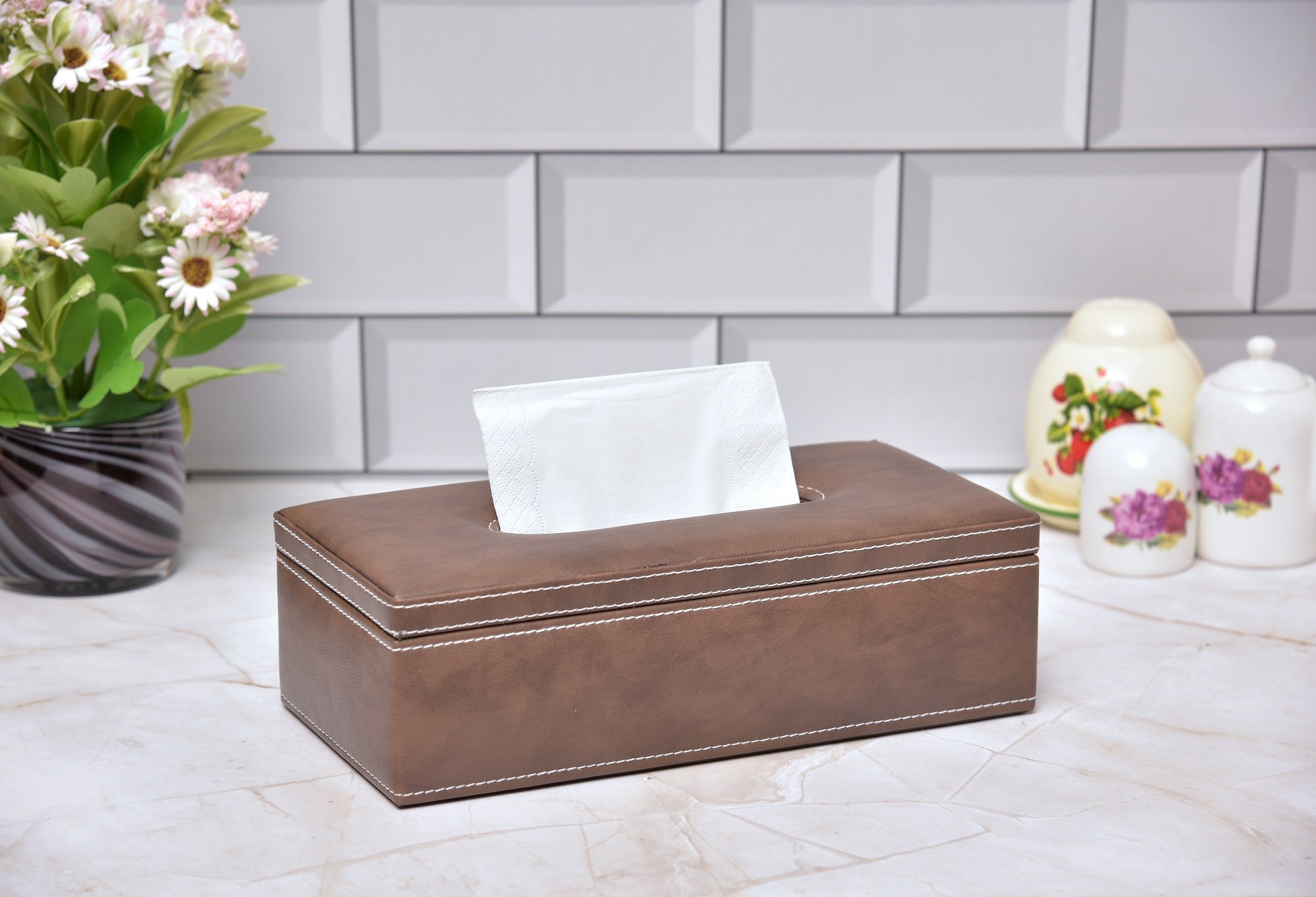 Rectangular tissue holder in dark brown leatherette with white tissues, lid-open