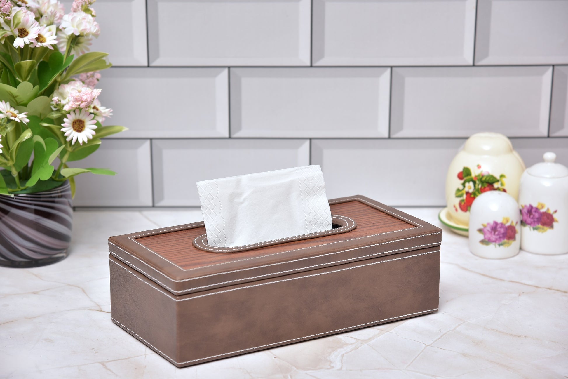 Rectangular tissue box holder with dark brown leatherette body and wooden-look top