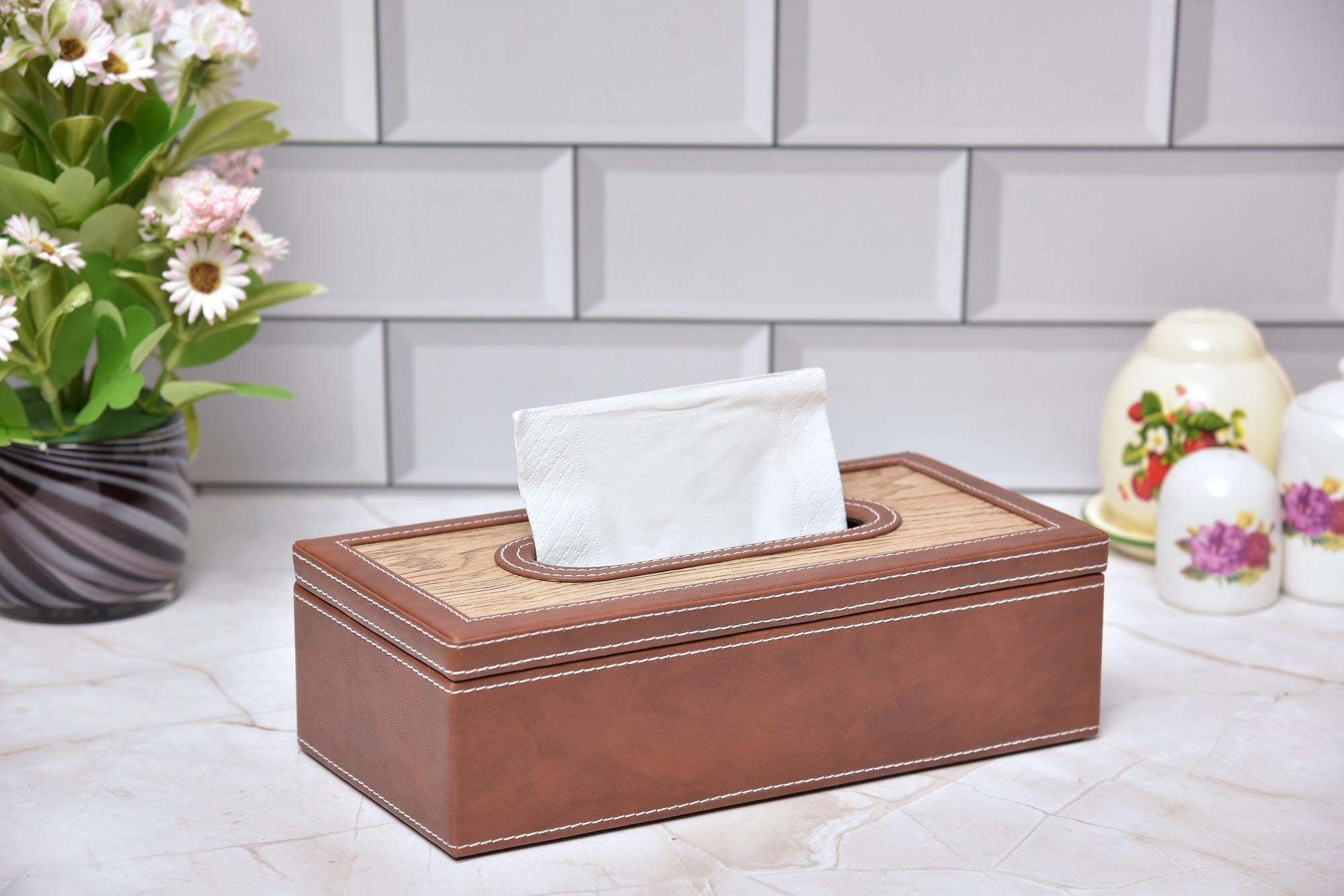 Rectangular tissue box holder with dark brown leatherette sides and wooden-look top
