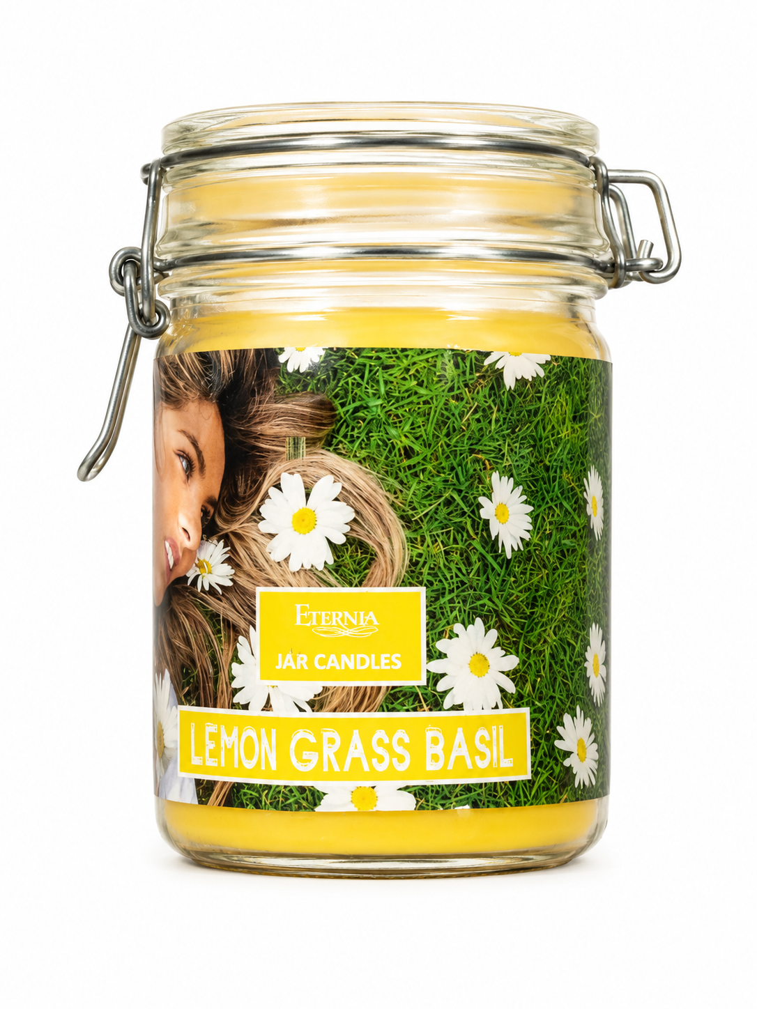 Jar candle in glass jar with metal clamp lid, lemon grass basil label and daisies