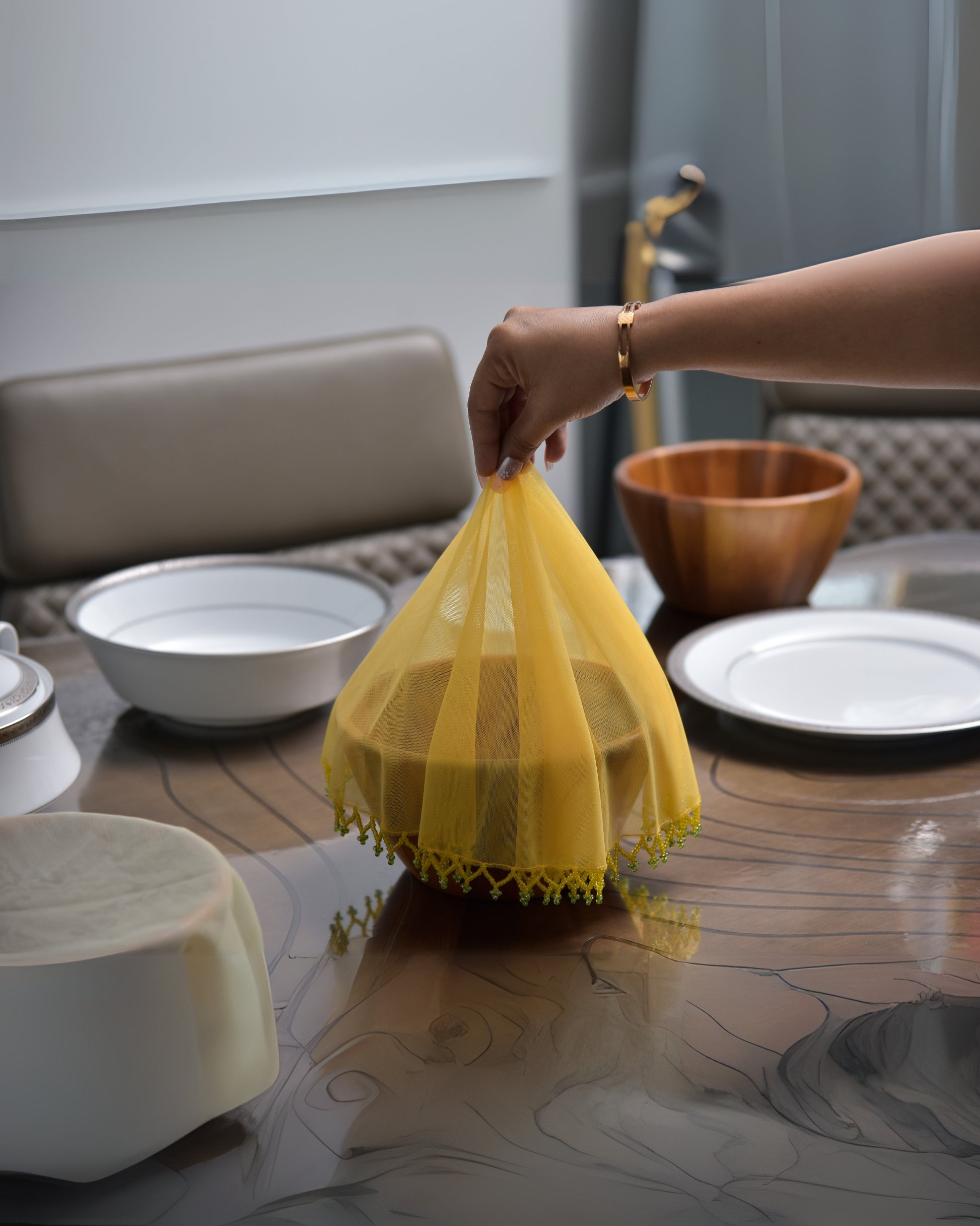 Decorative drink glass cover, yellow net with lace trim, cone-style