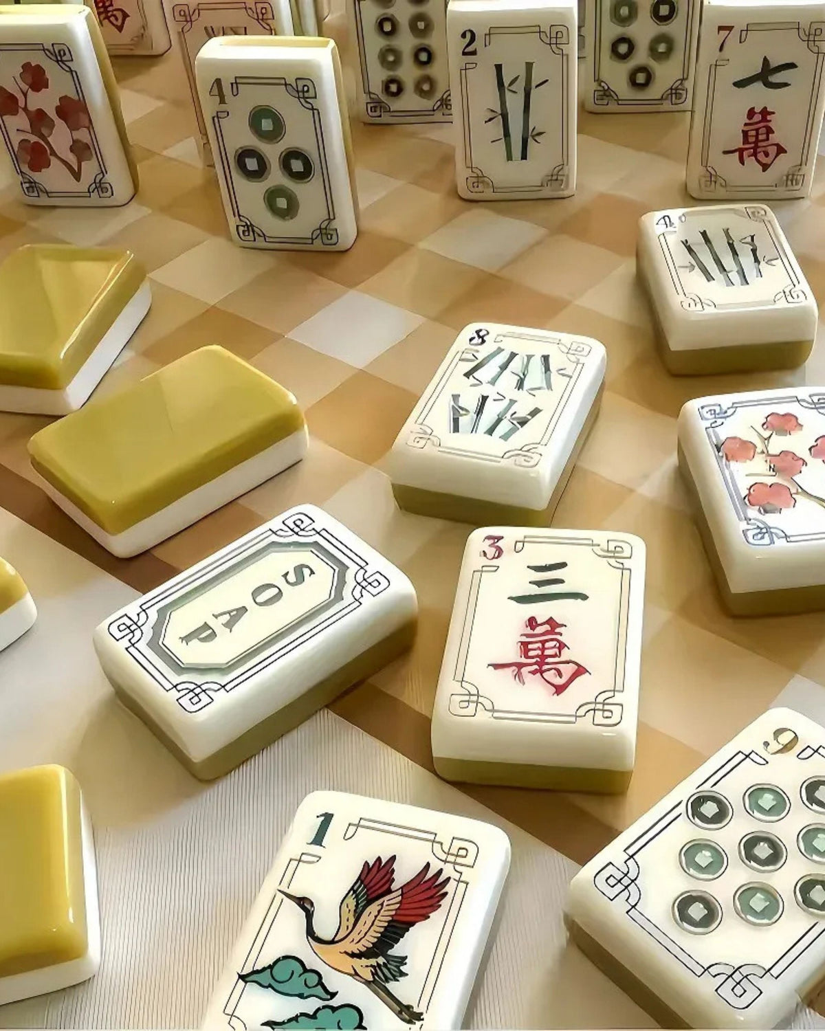Mahjong tile set with white tiles showing numbers, bamboo, and suit dots