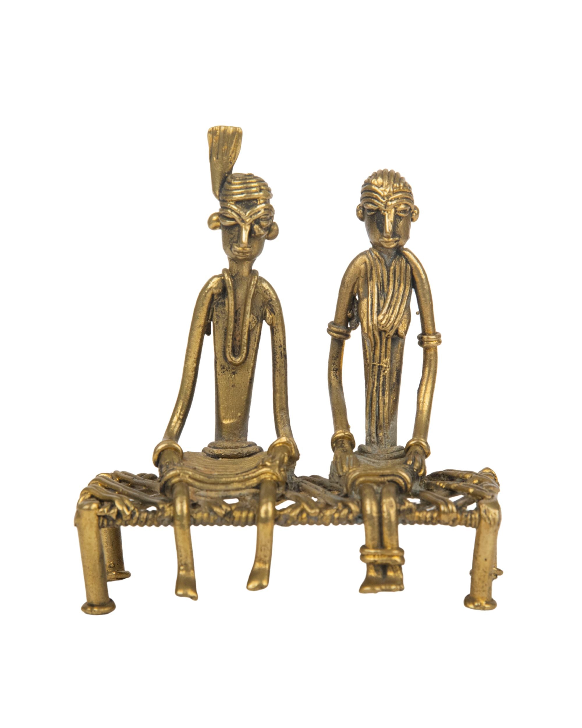 Premsons® Brass Figurine – Tribal Couple Sitting on Charpoy | Handcrafted Decorative Sculpture for Home & Office Décor
