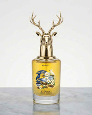 Eternia® Addict eau de parfum bottle with gold deer antler cap and amber liquid