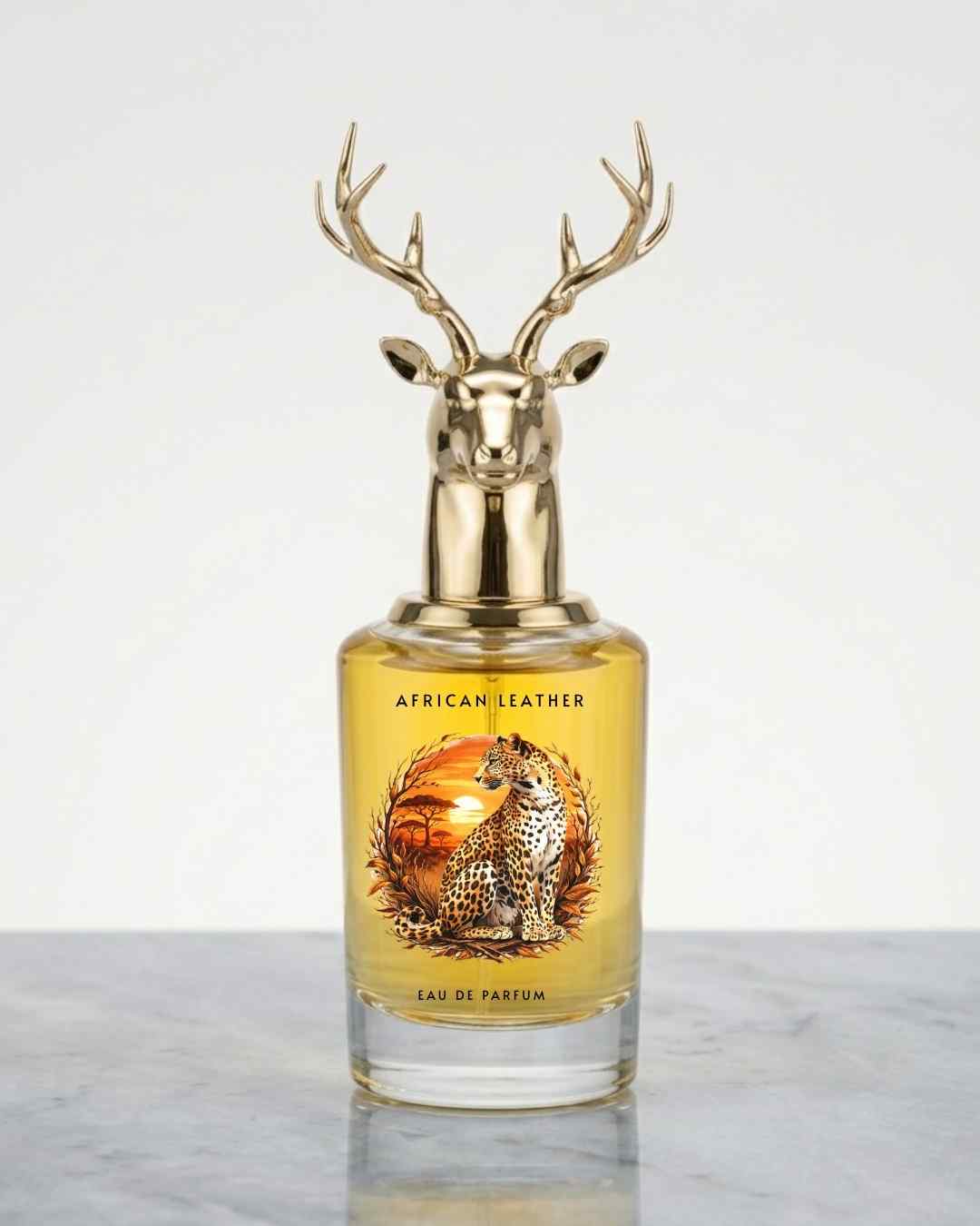 Leather spicy eau de parfum bottle with gold deer antler cap, amber glass