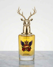 Eternia eau de parfum bottle with gold deer antler cap, labeled Black XS