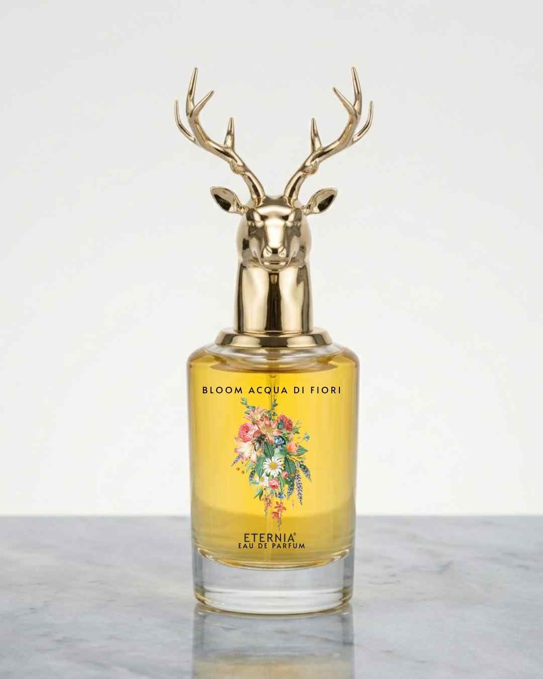 Eternia eau de parfum bottle with gold deer-antler cap and yellow floral liquid