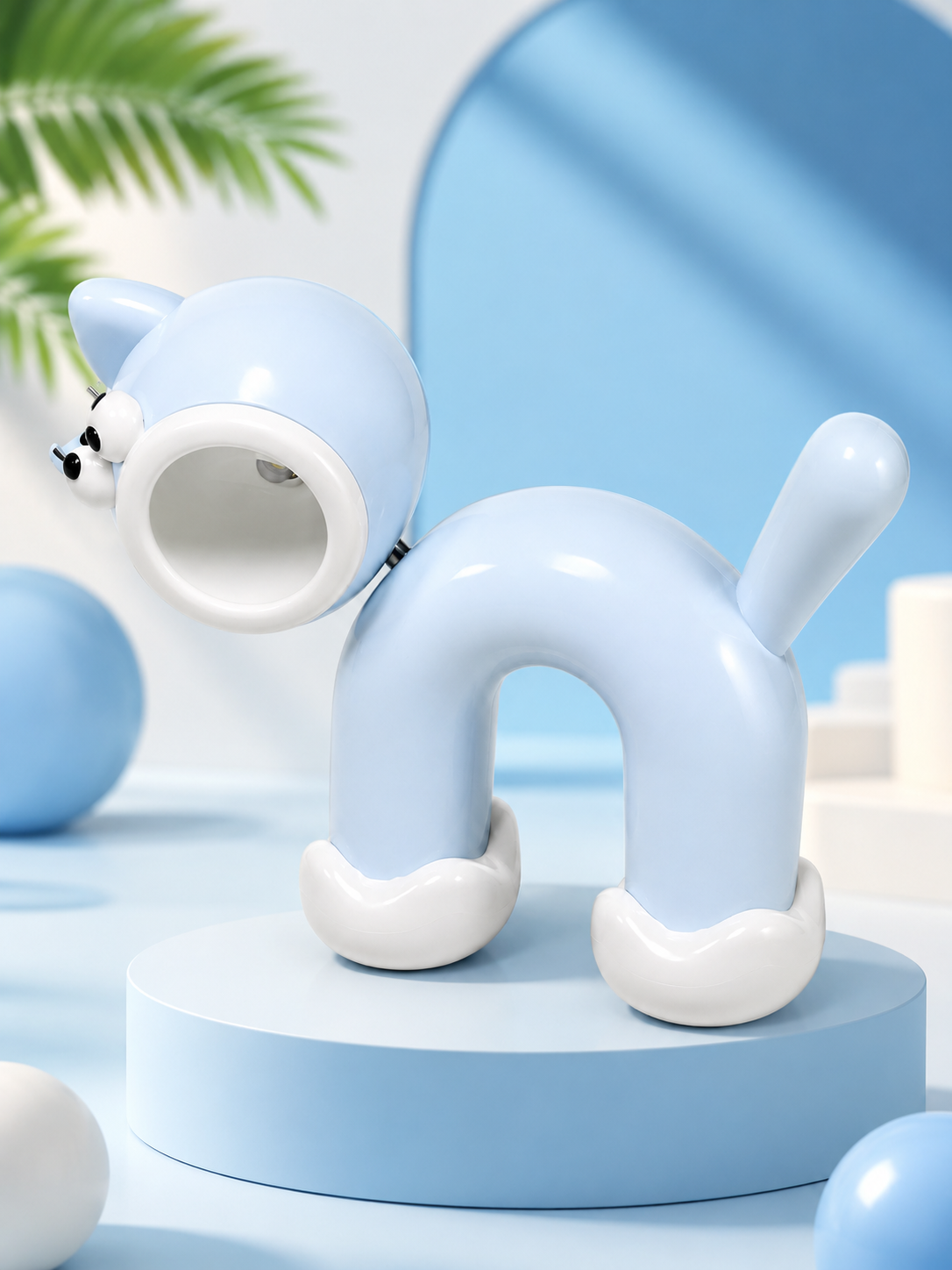 Cute cat LED night light in light blue silicone with glowing round lamp opening and front paws.