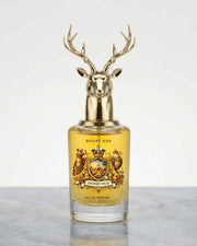 Eau de parfum bottle with gold deer antler cap and Desert Oud label
