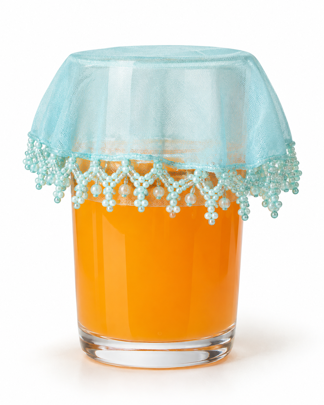 Sky blue net drink glass cover with teal and white beaded trim over a glass