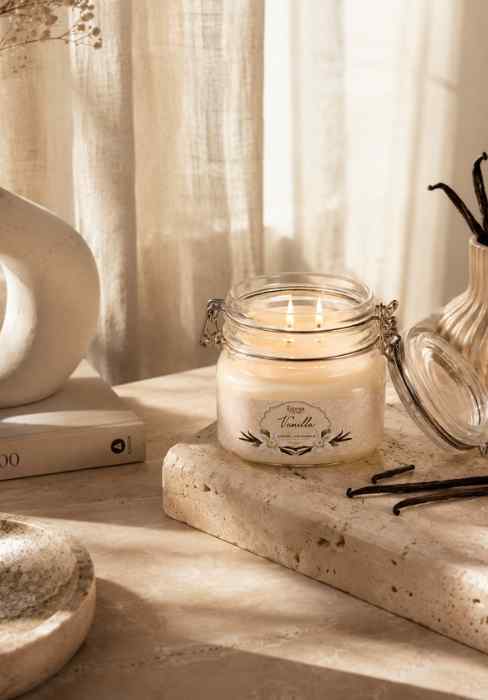Eternia vanilla scented jar candle in a clear glass jar with metal clasp lid