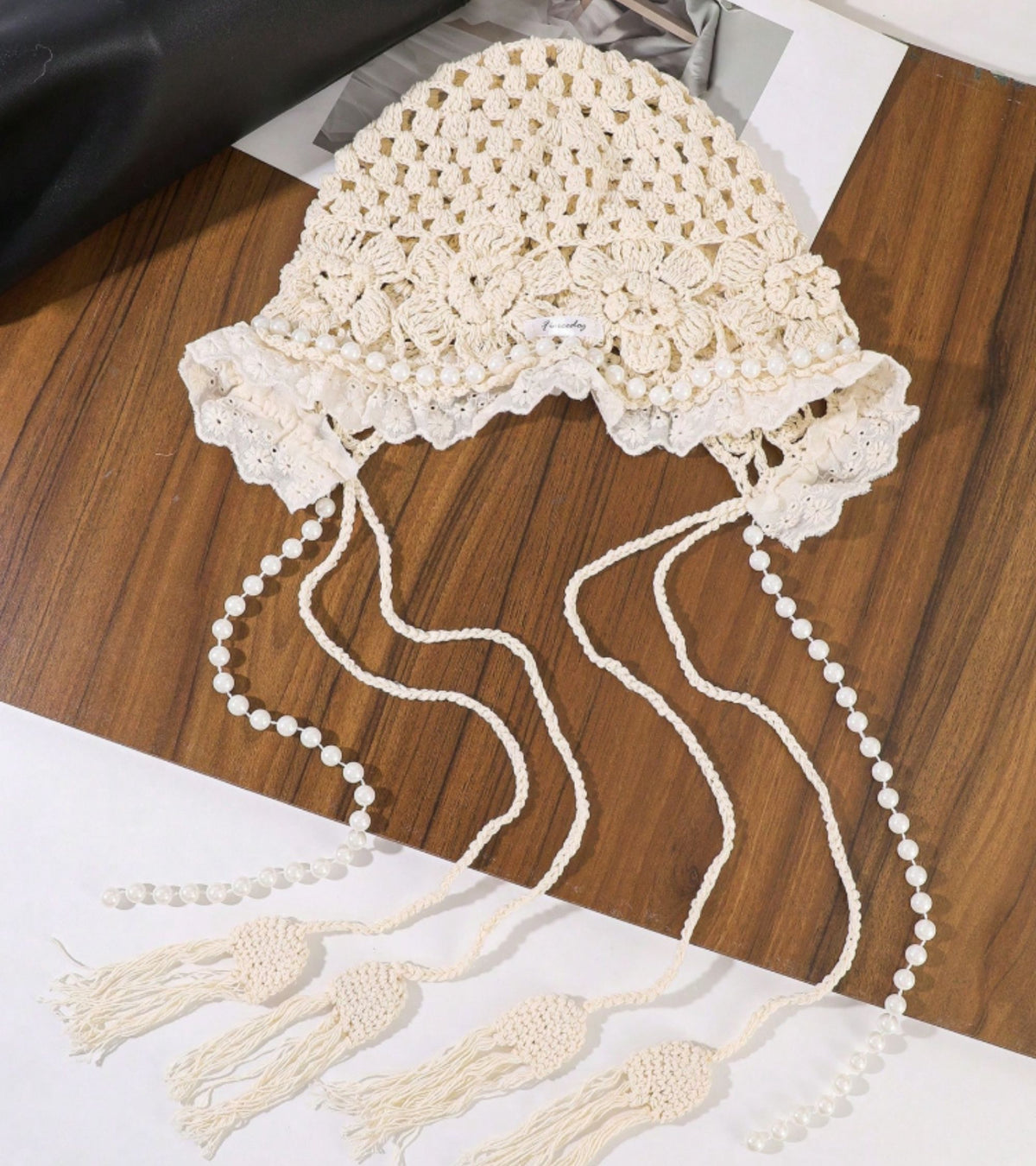 White lace crochet cap with pearl bead tassels and dangling strands