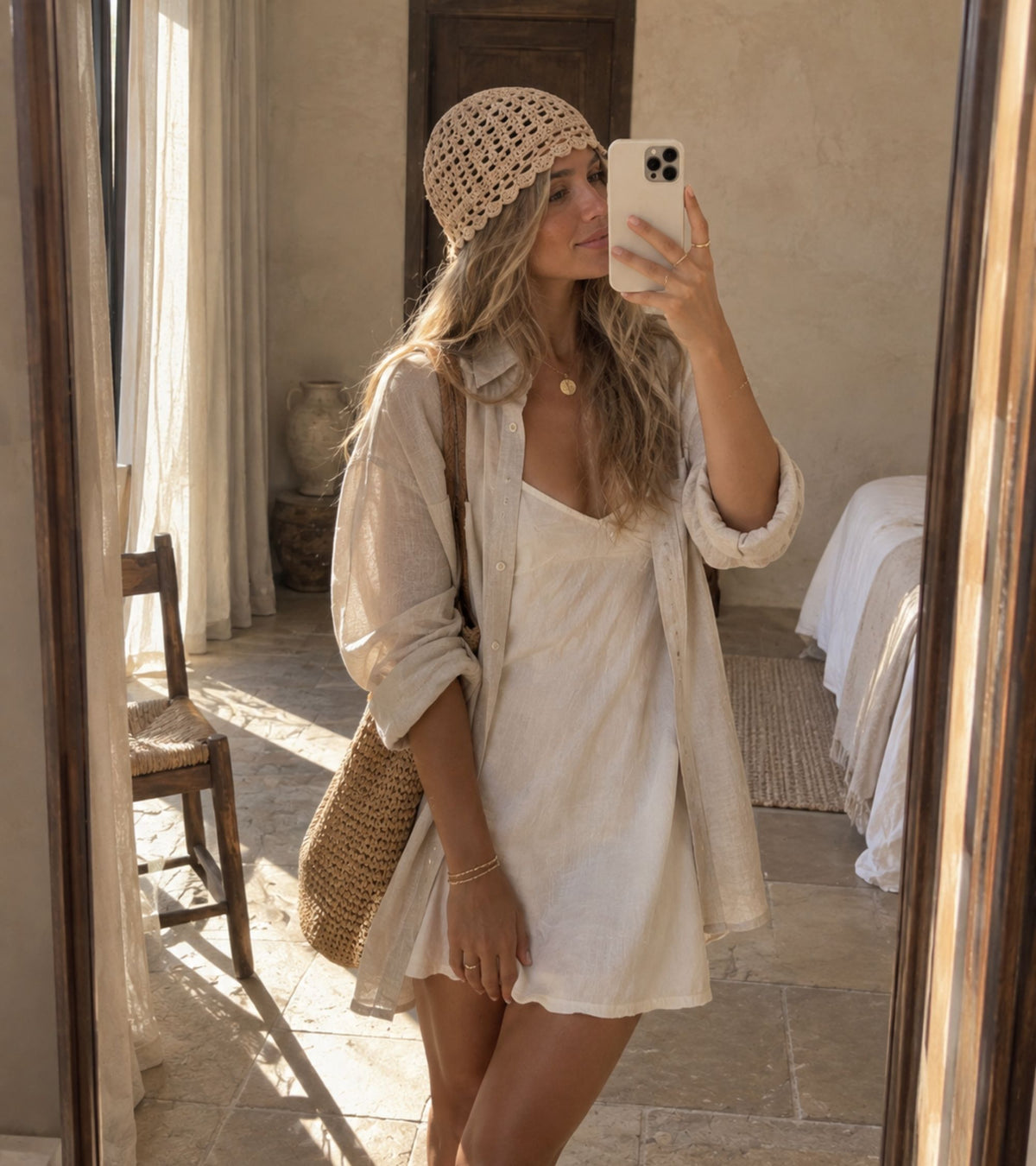 Beige crochet cap with patterned openwork crown, worn by model