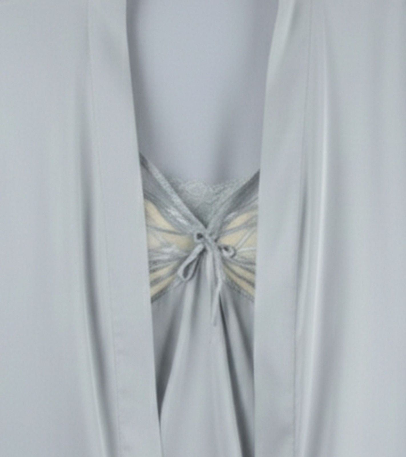 Close-up of mist grey nightdress neckline with butterfly lace bow detail