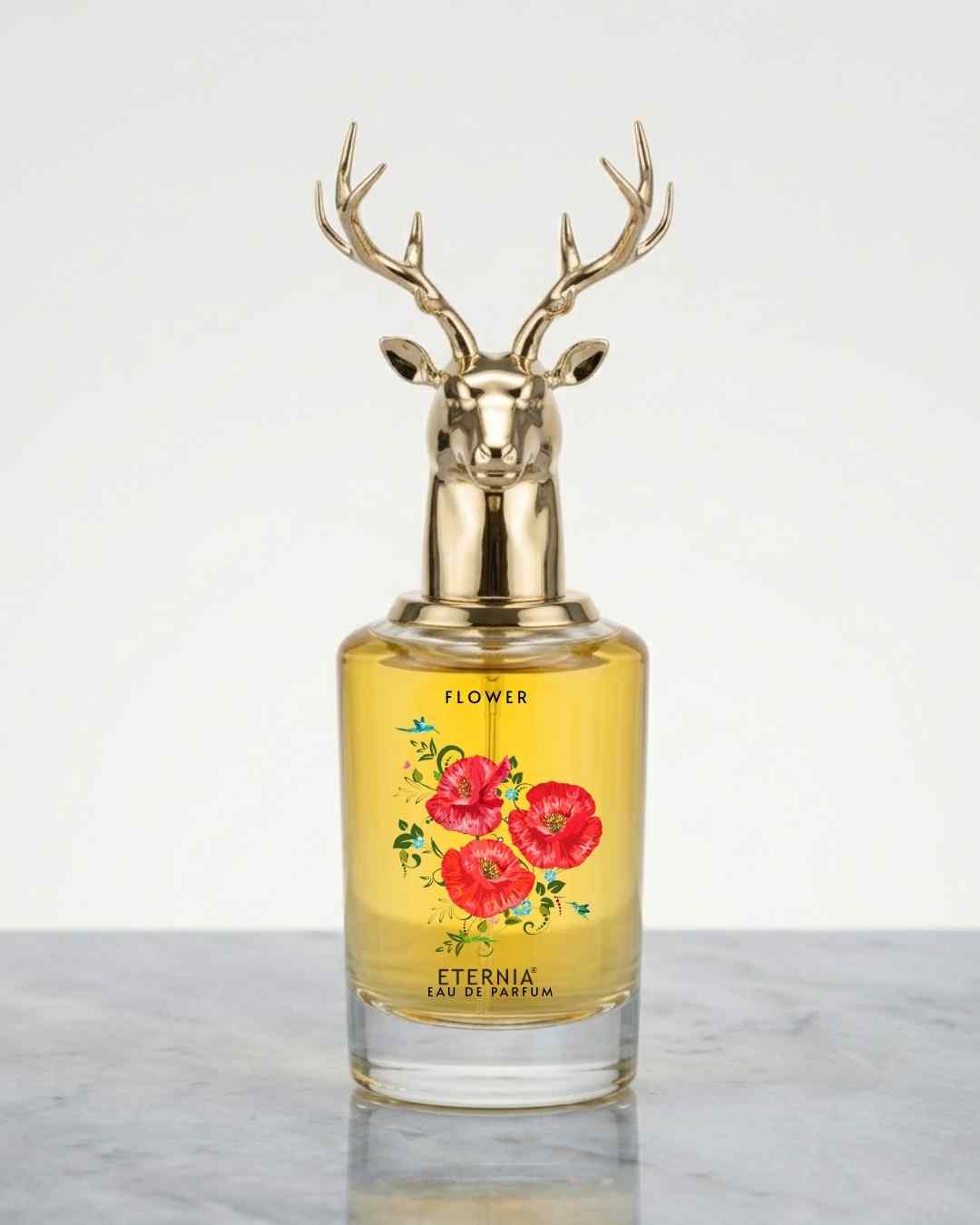 Eternia® Flower eau de parfum bottle with gold antler-style cap, floral label