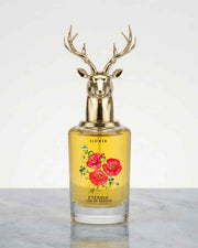 Eternia® Flower eau de parfum bottle with gold antler-style cap, floral label