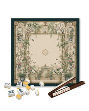 Square mahjong table mat with floral garden artwork; mahjong tiles and rack placed on it