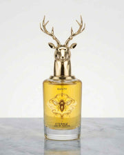 Eternia Guilty eau de parfum bottle with gold deer antler cap, amber glass