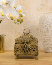 Brass decorative treasure box figurine with arched lattice front, ring handle, and feet