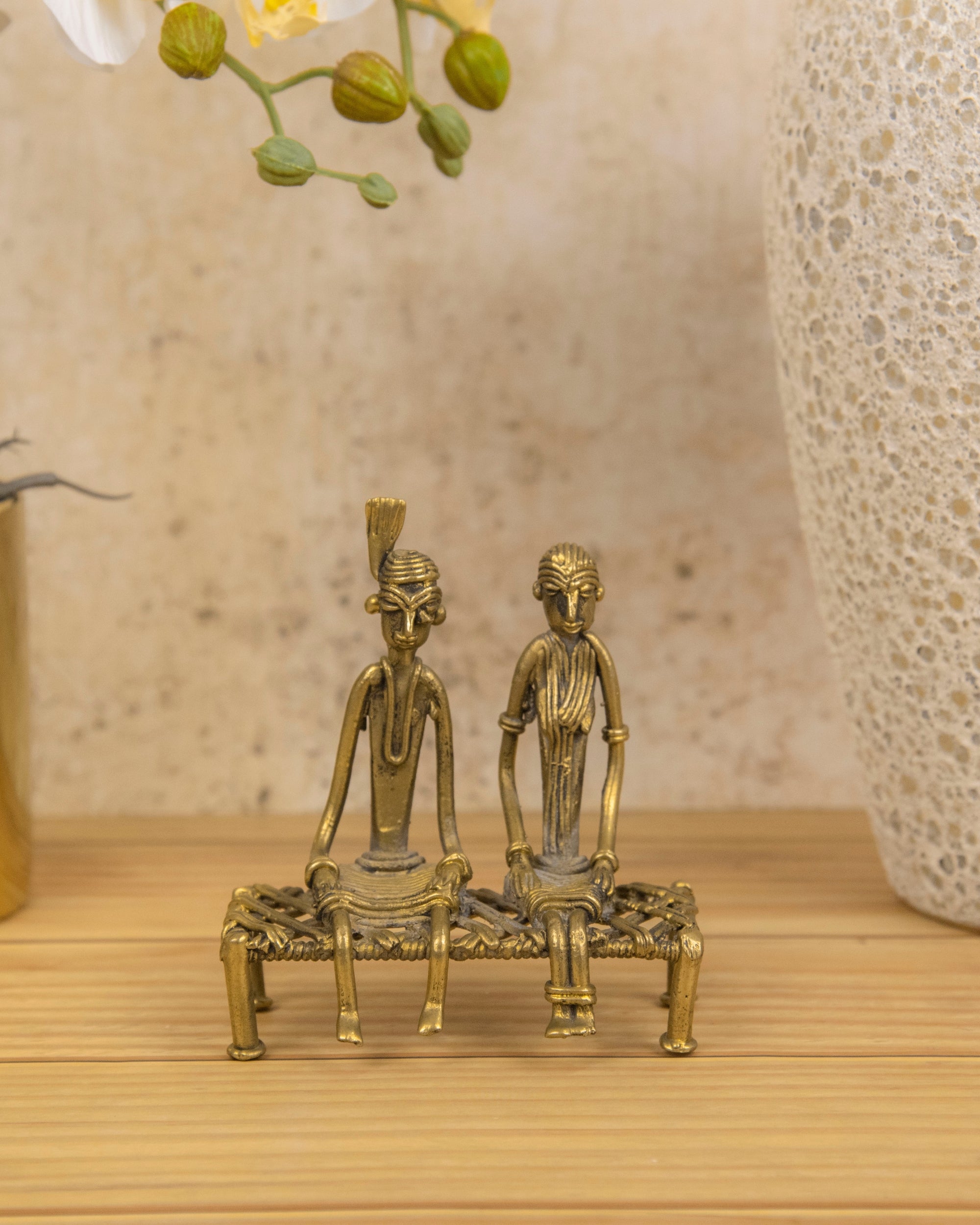 Premsons® Brass Figurine – Tribal Couple Sitting on Charpoy | Handcrafted Decorative Sculpture for Home & Office Décor