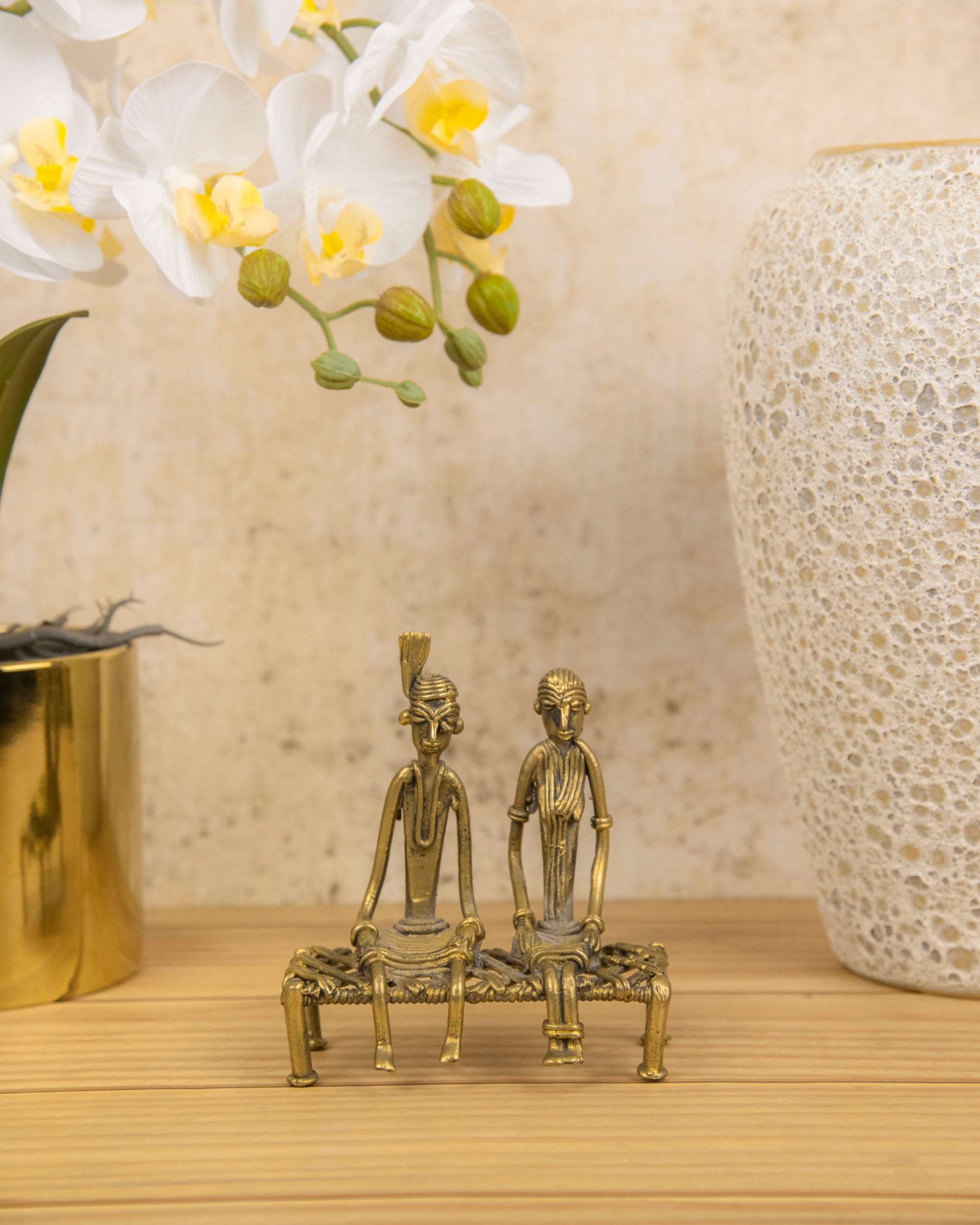 Premsons® Brass Figurine – Tribal Couple Sitting on Charpoy | Handcrafted Decorative Sculpture for Home & Office Décor