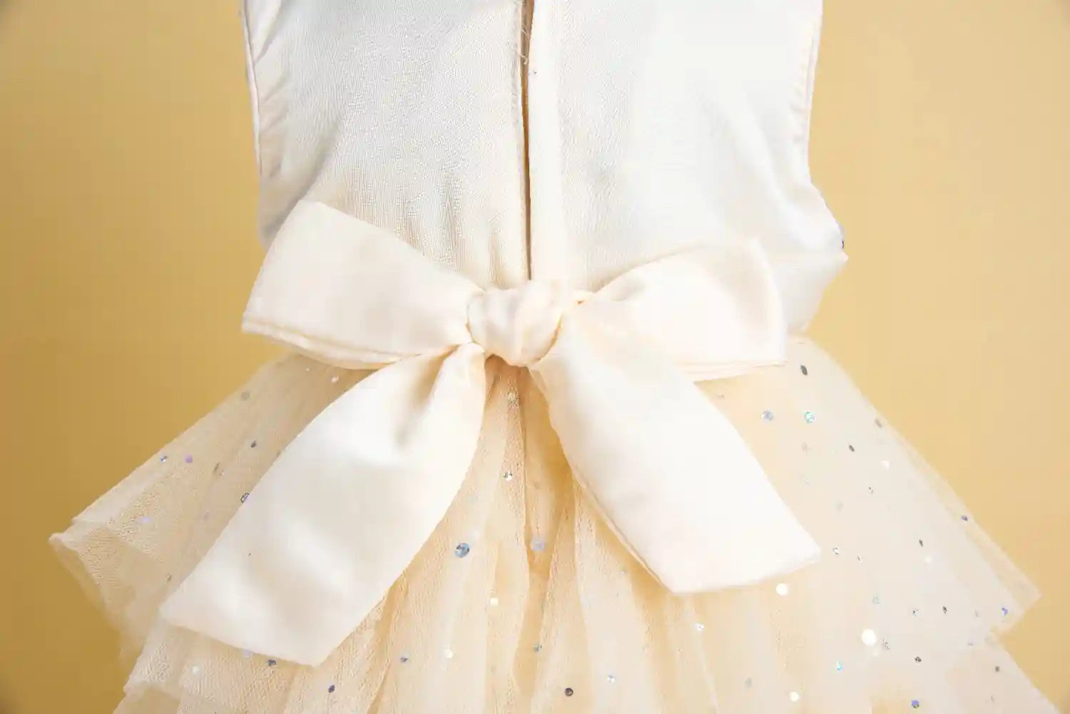 Premsons® Ivory Sequin Tulle Gown – 3D Flower Waist & Bow Back