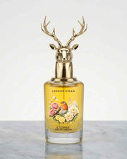 Eternia London Dream eau de parfum bottle with gold deer antler cap and floral bird label