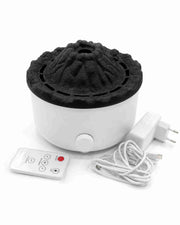 White aroma diffuser with black volcano-style lid and remote control panel