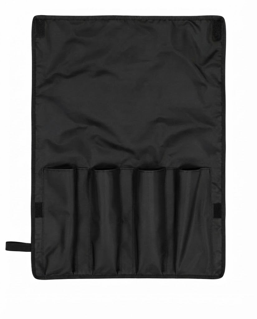 Black protective mahjong rack cover with multiple wooden-slot pockets and side handle.