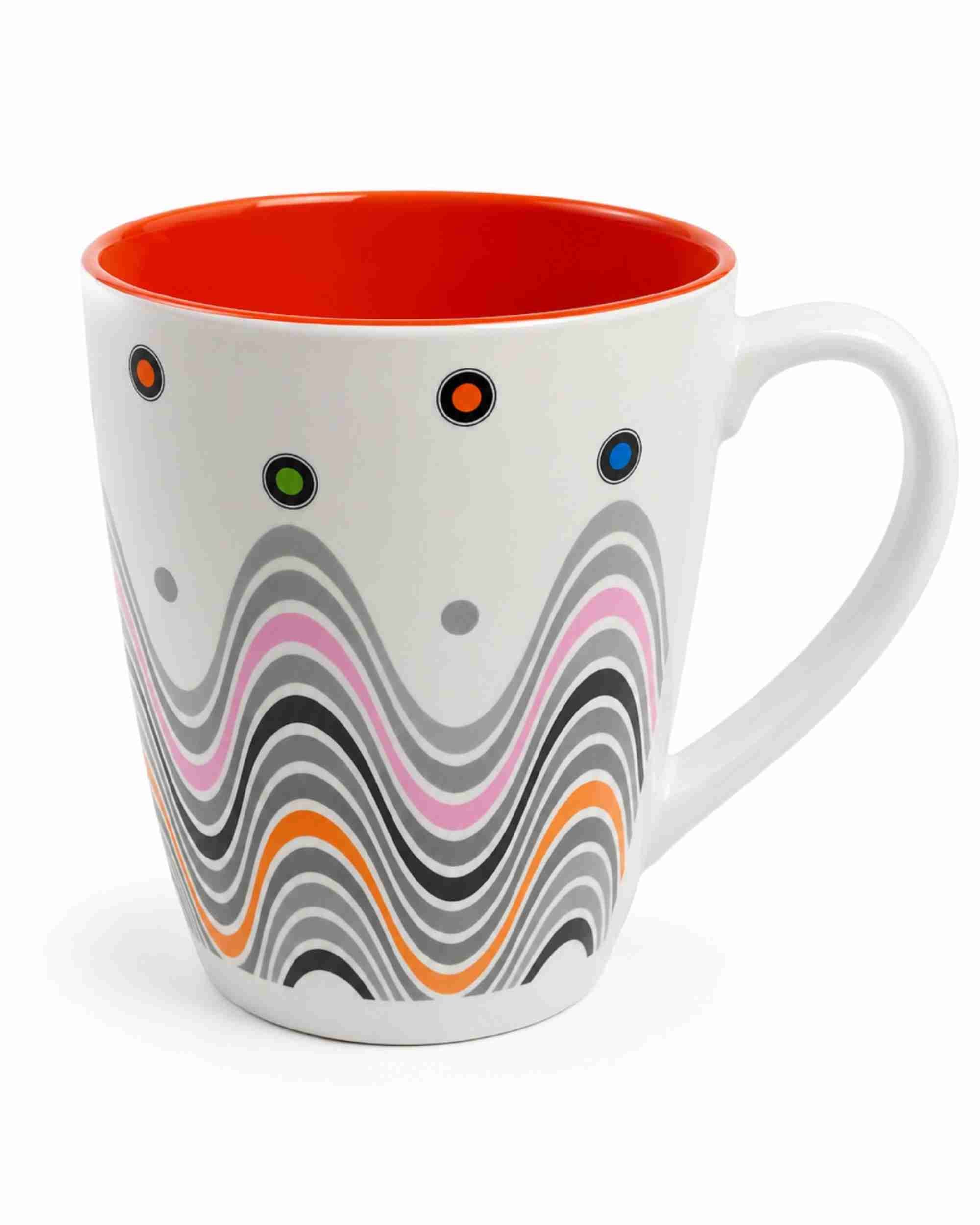 Ceramic coffee mug with orange interior and colorful wavy pattern on white body