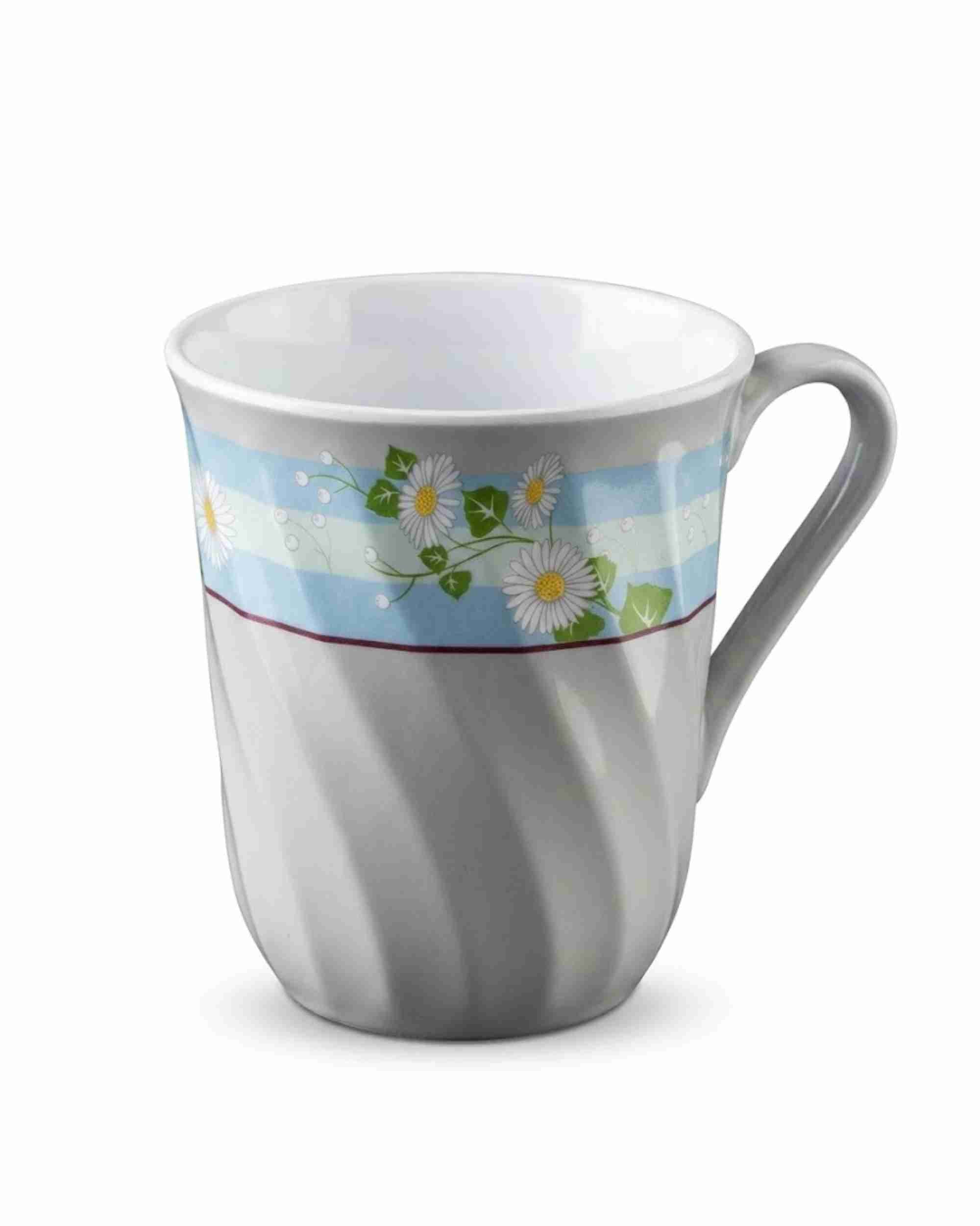 White ceramic coffee mug with blue stripe and daisy flower design, curved handle