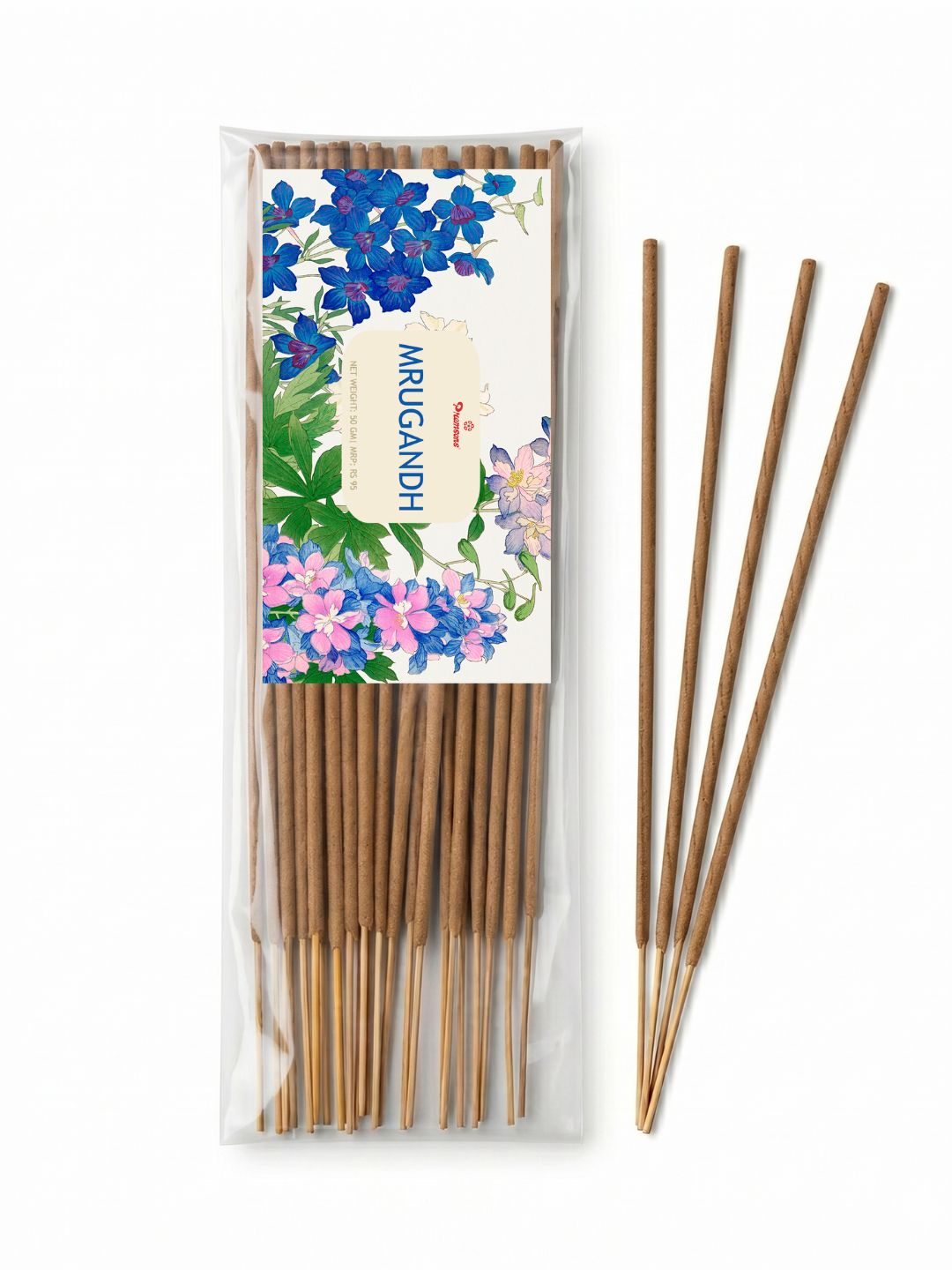 Incense sticks in clear pack with floral label, with loose brown sticks beside it