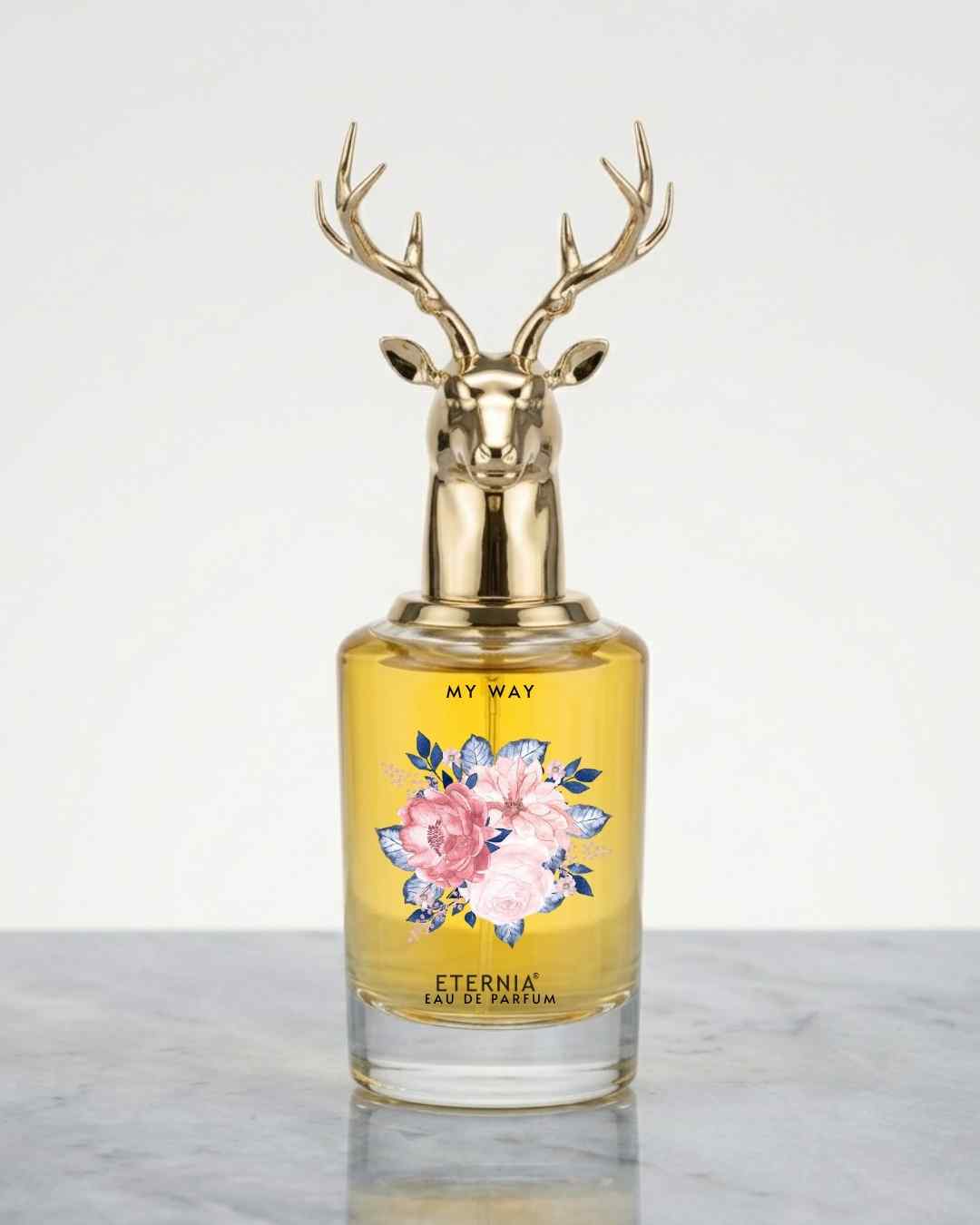 Eternia® My Way eau de parfum bottle with gold deer-antler cap and floral label
