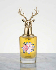 Eternia® My Way eau de parfum bottle with gold deer-antler cap and floral label