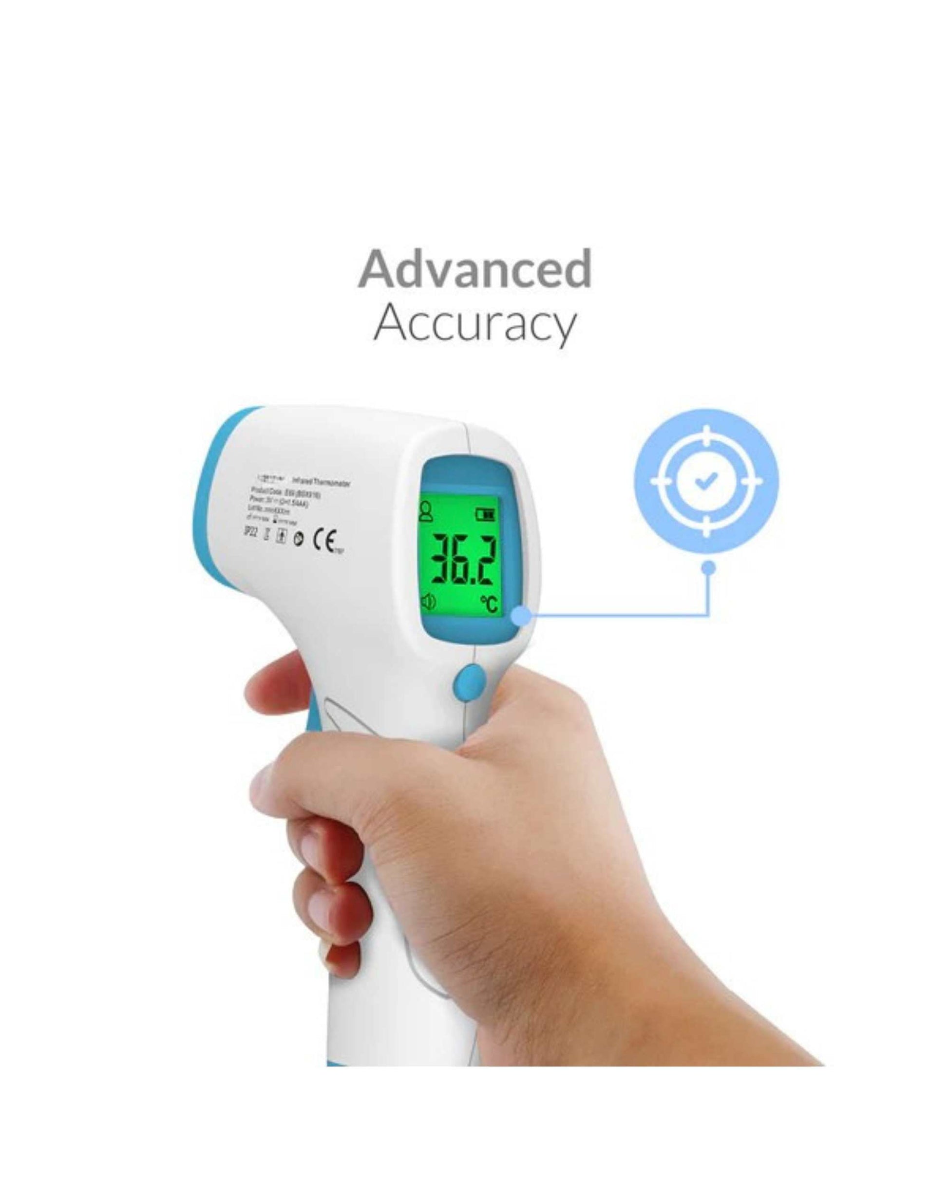 Non-contact infrared thermometer gun held in hand, LCD shows 36.2