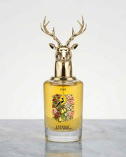 Eternia® oud eau de parfum bottle with gold deer-antler cap and glass body
