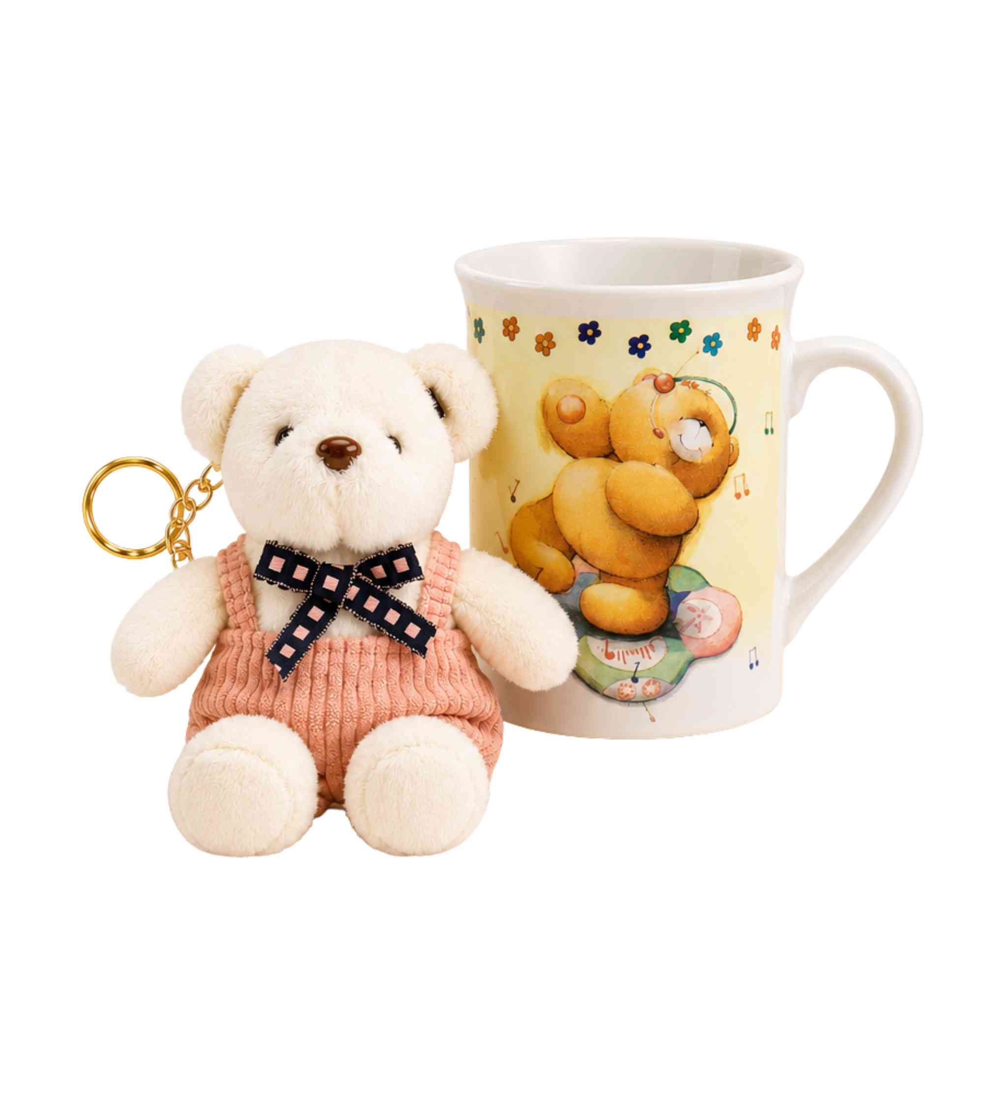 Ceramic mug with teddy bear plush keychain and colorful teddy illustration on white cup