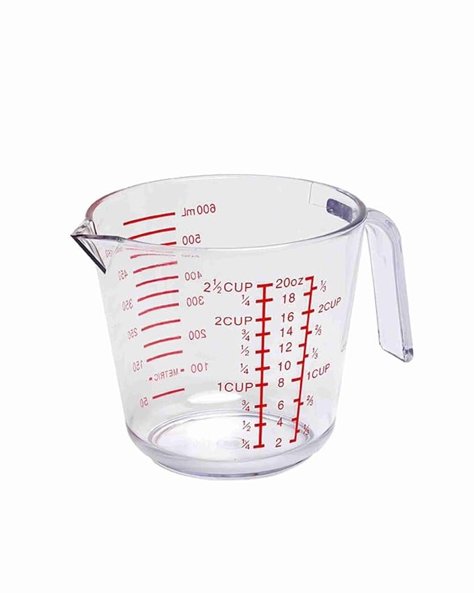 Clear plastic measuring jug with red measurement markings and pouring handle
