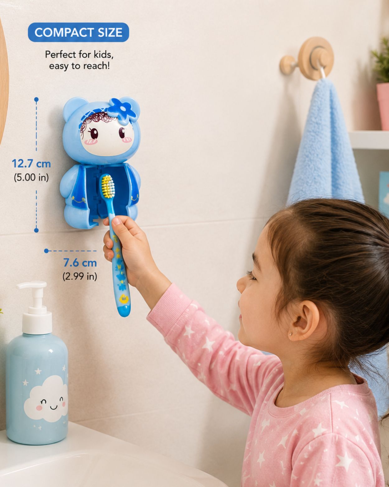Blue cartoon toothbrush holder on wall with kids toothbrush and suction cup