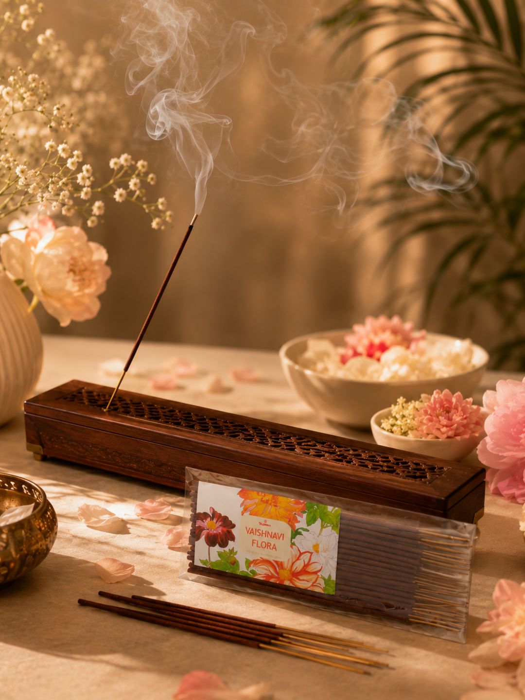 Burning incense sticks on a wooden holder with visible smoke
