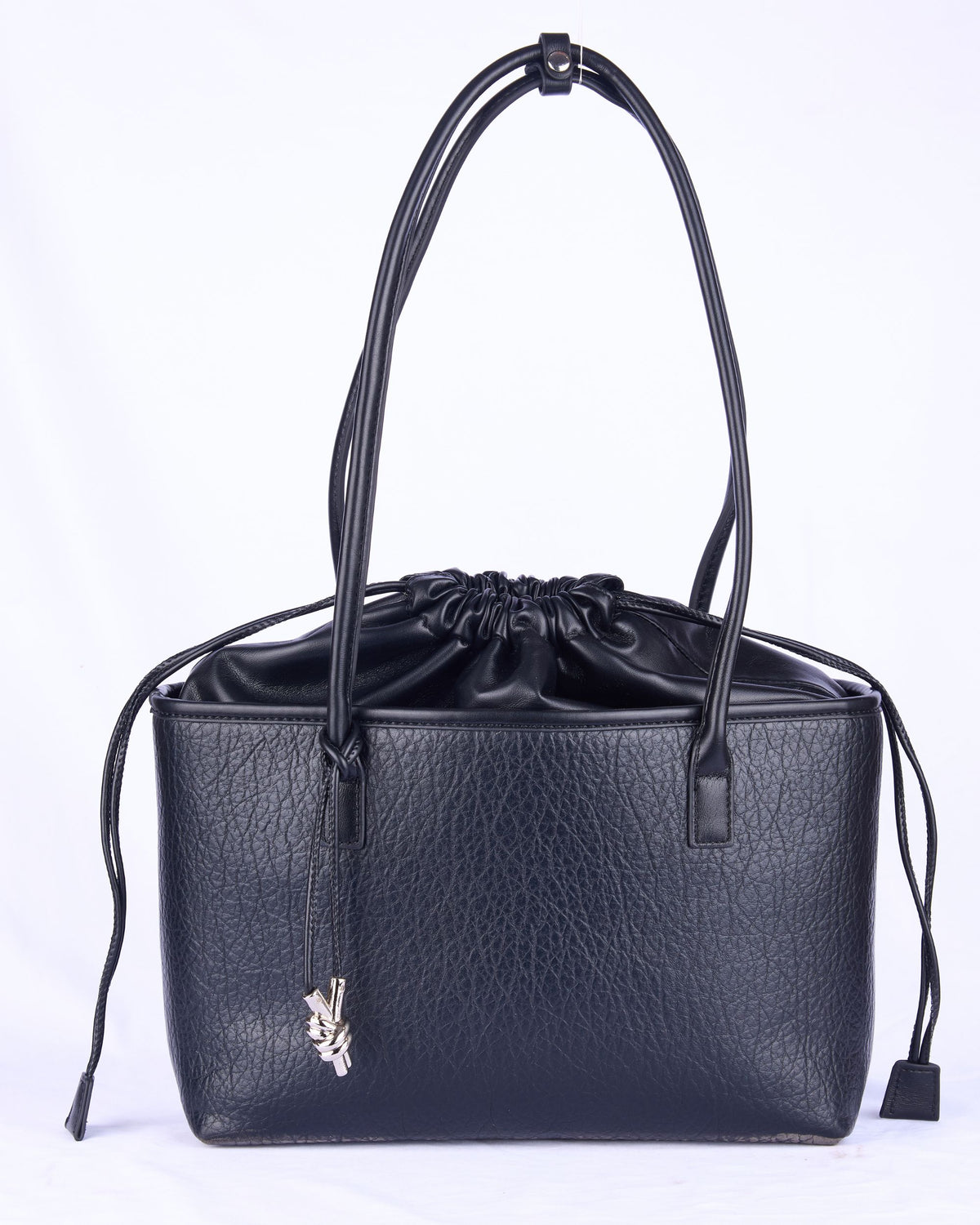 Black women's handbag with ruched drawstring top, two handles, and small key charm
