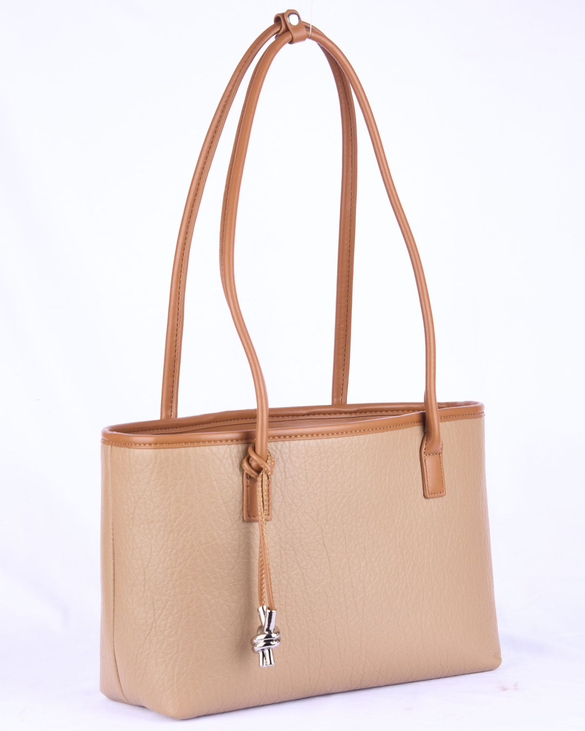 Light brown shoulder handbag with drawstring closure, long handles, and metal charm