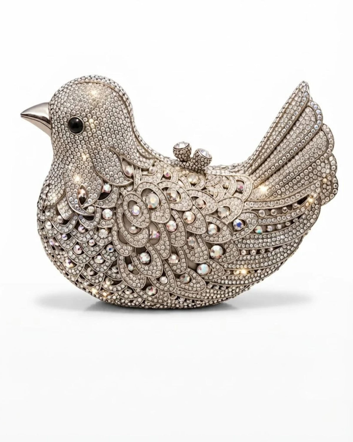 Silver crystal bird clutch with jeweled beak and fan-shaped raised tail